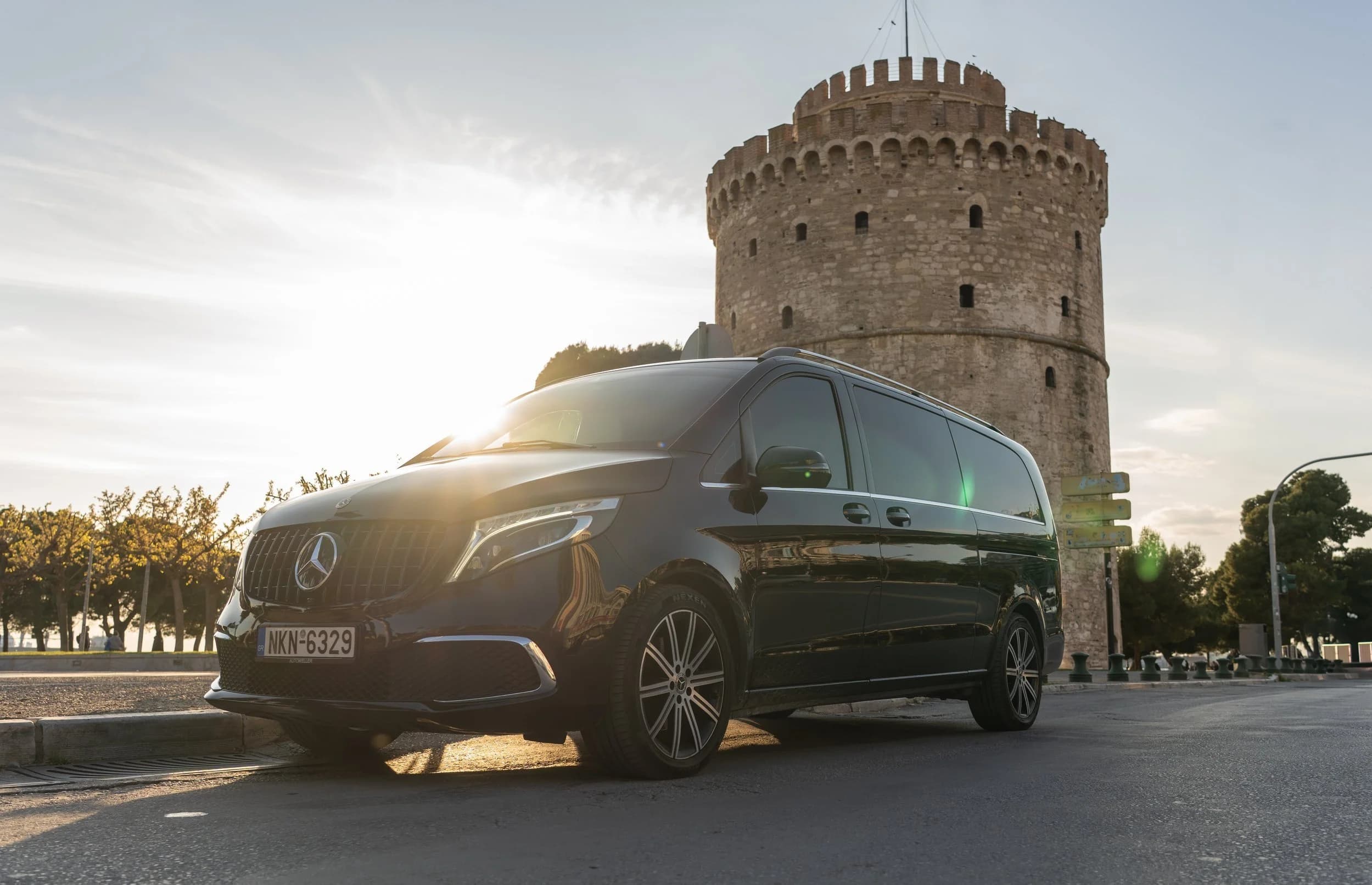 Private transfer vehicle beside the White Tower in Thessaloniki